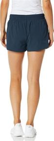 img 1 attached to Kanu Surf Stretch Workout Boardshort Women's Clothing : Swimsuits & Cover Ups