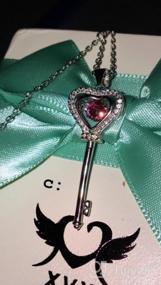 img 7 attached to 💖 XVX Beating Heart Key Necklace in 925 Sterling Silver with White Gold Plating, studded with Cubic Zirconia Dancing Birthstone Pendant, Perfect Forever Love Jewelry Gift for Women and Girls