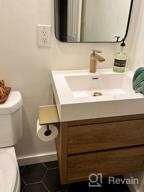 картинка 1 прикреплена к отзыву Matte Black TRUSTMI Toilet Paper Holder With Phone Shelf | Wall Mounted Bathroom Storage & Tissue Dispenser от Jeremy Adams