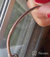 картинка 1 прикреплена к отзыву NINAQUEEN Серебристый змеиный браслет на цепочке с эмалью, сделанный вручную, и ювелирный ящик - идеальный для подвесок и подарков. от Hector Szymczak