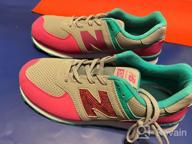 img 1 attached to 574 V1 Winter Suede Lace-up Sneaker for Kids by New Balance review by Bradley Mutha