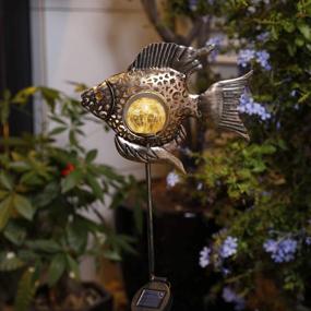 img 1 attached to Illuminate Your Garden In Style With Bronze Solar Fish Stake Lights
