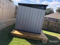 img 1 attached to Grey Keter Artisan Shed - Modern Design - Large 9X7 Foot Outdoor Storage With Floor For Patio Furniture, Tools, Lawn Mower, And Bike Storage review by Katie Ramirez