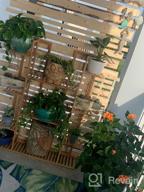 img 1 attached to Indoor Outdoor Flower Pot Rack: 9-Tier Bamboo Shelf Display Holder For 17 Potted Plants, Perfect For Patio, Garden, Balcony, Or Living Room Décor review by Daniel Roe