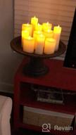 img 1 attached to Smtyle Battery Operated Flameless Fake Candles with Remote Control and Flickering Moving Flame for Fireplace Candelabra Holder - Ivory Flat Top, 6 Inch review by Ricky Khan