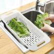 minesign's adjustable over the sink collapsible colander - perfect for fruits and veggies in your kitchen logo