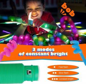 img 1 attached to Satkago 12Pcs Pop Fidget Tubes Glow In The Dark Party Supplies, LED Light Up Fidget Toys Pack Party Favors For Kids (6Pcs 29Mm Glowing Pop Tubes + 3Pcs 29Mm Crocodile Pop Tubes + 3Pcs 19Mm Pop Tubes)