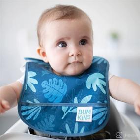 img 3 attached to Bumkins Starter Bib, Waterproof Baby Bib for Infants, Fits Babies 3-9 Months - Dinosaurs, Blue Tropic (2-Pack)