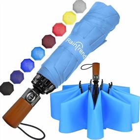 img 4 attached to Компактный ветрозащитный дорожный зонт с голубым перевернутым дизайном, идеально подходящий для пеших прогулок: прочная деревянная ручка, функциональность наизнанку и защита рюкзака от дождя.