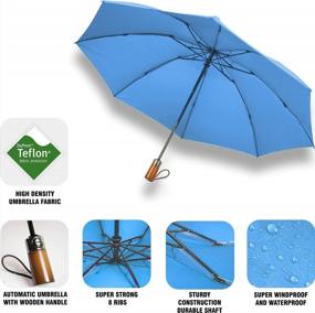 img 3 attached to Компактный ветрозащитный дорожный зонт с голубым перевернутым дизайном, идеально подходящий для пеших прогулок: прочная деревянная ручка, функциональность наизнанку и защита рюкзака от дождя.