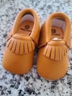 img 1 attached to Adorable And Comfortable Baby Moccasins: Delebao Soft Sole Tassel Crib Shoes review by Justin Bradford