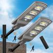 2pack 500w lovus solar led street light with motion sensor - perfect for garage, driveway & outdoor parking lot lighting! logo