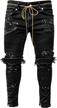 chartou men's paint-splattered distressed denim pants with zipper closure and tapered leg logo