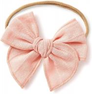 handmade claire bow by little poppy co: solid embroidered stripe design logo