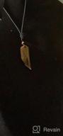 img 1 attached to Stylish COAI Wolf Tooth Necklace With Healing Crystal For Men review by Ashley Watkins