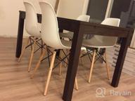 img 1 attached to Set Of 4 White Plastic Side Dining Chairs With Natural Wood Legs - Modern Design, No Arms, And Back Support review by Will Aesthetics