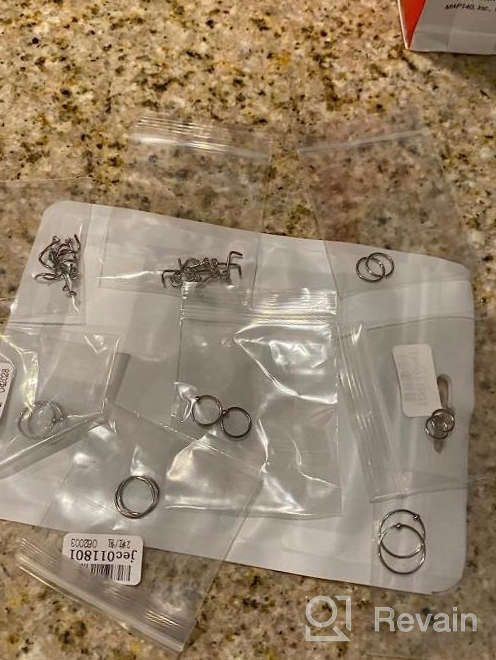 img 1 attached to Stylish And Durable Nose Rings For Women: 28-Piece Set Of 20G Stainless Steel Studs, Hoops, And Crystals! review by Ashley Jones