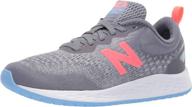 👟 stylish and sturdy: new balance gunmetal tahitian carolina girls' athletic shoes logo