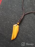 img 1 attached to Stylish COAI Wolf Tooth Necklace With Healing Crystal For Men review by Dominique Hughes