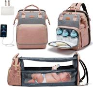 🎒 kuak 3-in-1 diaper bag backpack including travel bassinet, changing station, and insulated pockets logo
