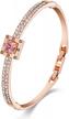 spiritual rose gold crystal bangle bracelets for women: the menton ezil collection logo