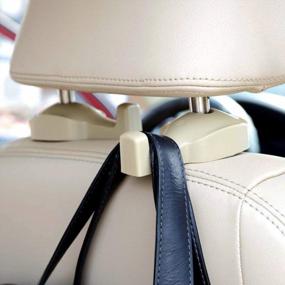 img 1 attached to Beige Headrest Hooks For Car Back Seat - Set Of 2 Hanger Holders For Bags, Purses & Groceries