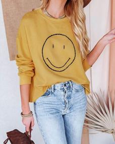img 2 attached to Smiley Graphic Crewneck Sweatshirt For Women - Long Sleeve Casual Pullover Top With Happy Face Design