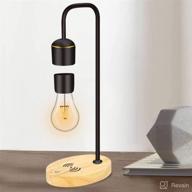 magnetic levitating light bulb in real wood: black floating desk lamp with led night lights, luxury wireless charging pad (compatible with apple/android) - perfect christmas gift логотип