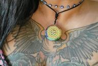 img 1 attached to Experience Chakra Healing Energy with 🧘 Our Luminous Orgonite Pendant Om Symbol Necklace review by Devin Bro
