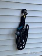 img 1 attached to Organize Your Garden With Morvat Premium Heavy-Duty Metal Hose Hanger, Holds Up To 150 Ft Hose review by Ashley Belehar