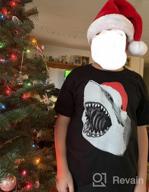 img 1 attached to 🦈 Youth Funny Holiday Shark Christmas T Shirt - Santa Jaws Cool Novelty Tee for Kids review by Jacob Fish