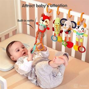 img 2 attached to TUMAMA 4 Pack Baby Toys: Hanging Crib Toys for Newborn Infant Development, Car Seat Stroller Soft Plush Rattles Toy for Babies (0-12 Months)