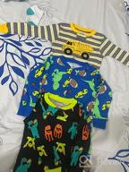 img 1 attached to 3-Pack Snug Fit Footed Cotton Pajamas for Boys by Simple Joys Carter's review by Alex Romero