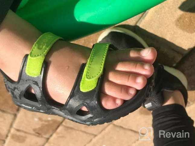 img 1 attached to Crocs Swiftwater River Sandal Sandal: Unisex Kids, Black/Volt Green, Size 10 M - A Comfortable and Stylish Choice for Little Feet review by Jeff Hall