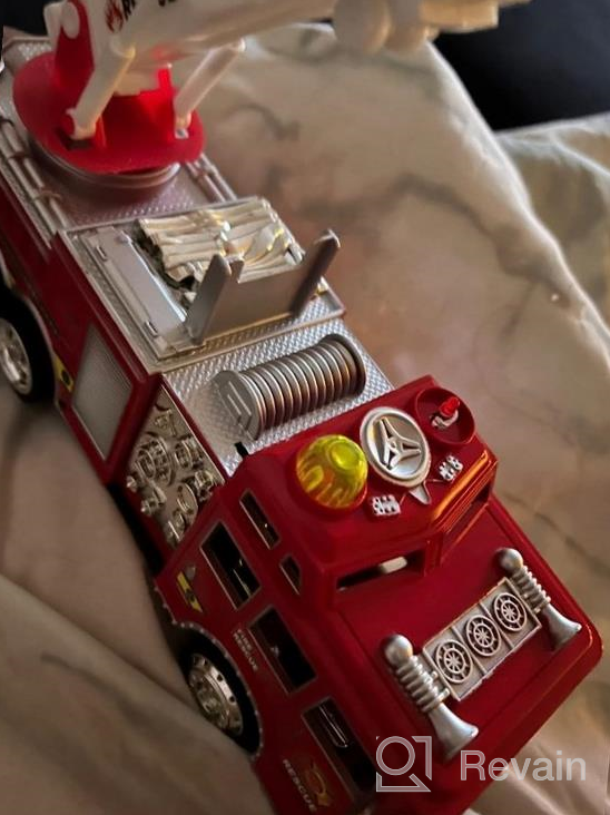 img 1 attached to Toysery Fire Truck Toy For Kids With Siren, Lights & Extending Ladder - Bump And Go Red Toddler Toys For Boys review by Thomas Unruh