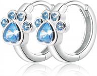 stylish and hypoallergenic sterling silver cubic zirconia earrings with adorable dog and cat paw designs logo