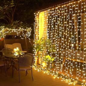img 4 attached to 🎄 JMEXSUSS 300 LED Remote Control Curtain Lights Plug in for Christmas, Wedding, Garden & Party Decor - Warm White
