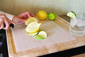 img 2 attached to 🔪 Camco 43770 Stowaway Flexible Cutting Mat: A Durable and Space-Saving Kitchen Essential