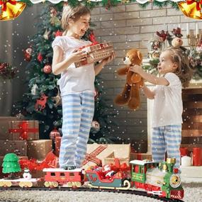 img 3 attached to 🚂 Electric Christmas Train Set with Lights, Sounds and 15 Railway Tracks for Under / Around The Christmas Tree - Perfect Toy Train Set for Kids Ages 3 and Up