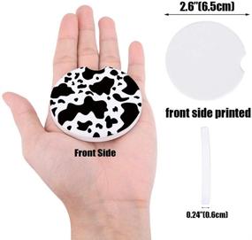 img 2 attached to 🐄 Set of 2 Car Coasters, 2.56" Absorbent Cup Holder Coasters with Finger Notch, Stylish Black And White Cow Spots Print, Stone Texture Auto Cupholder Coaster Set for Men and Women