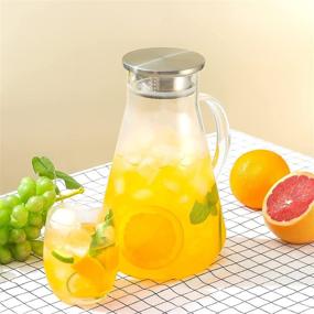 img 3 attached to 🥛 Tbgllmy 2L 68oz Glass Pitcher With Lid, Hot & Cold Water Pitcher With Handle, for Homemade Fruit Beverage, Juice, Iced Tea & Milk