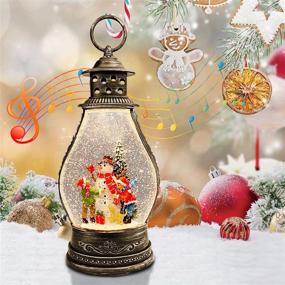 img 4 attached to Christmas Musical Snow Globe Lantern with Lighted Snowman Family, Water Glittering Swirling - 6H Timer, 8 Christmas Songs, USB or AAA Battery Operated - Ideal for Christmas Home Decoration