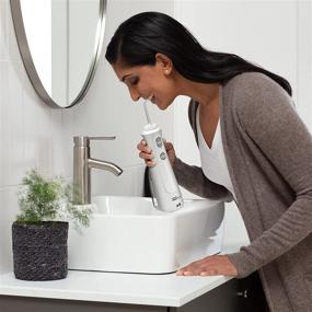 img 3 attached to 💦 Waterpik Cordless Pearl: Portable Water Flosser for Teeth, Gums, Braces Care and Travel – ADA Accepted, WF-13 White