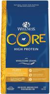 wellness core dry puppy dog food - wholesome grains, high protein, chicken & turkey meal kibble, natural, made in usa, with added vitamins, minerals, and taurine logo