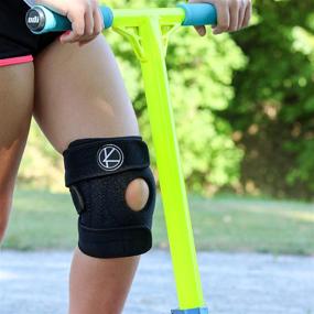 img 2 attached to 🩺 Optimal Adjustable Knee Brace Support for Kids - Youth Knee Support for Arthritis, ACL, MCL, LCL, Sports Exercise, Meniscus Tear, Dance. Neoprene Stabilizer Wrap with Open Patella for Children, Boys, Girls (Black)