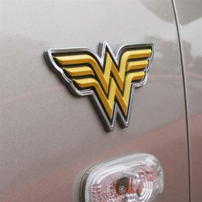 img 1 attached to 🚗 Enhance Your Car with Fan Emblems Wonder Woman 3D Car Badge - Classic Logo (Black, Yellow and Chrome)