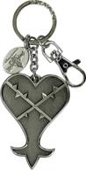 😍 disney kingdom hearts heartless keyring: a captivating accessory for fantasy game lovers logo