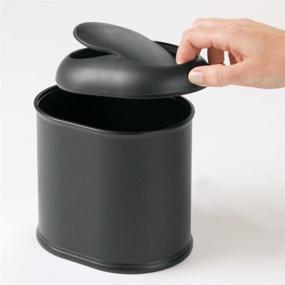 img 1 attached to 🗑️ mDesign Modern Black Mini Wastebasket Trash Can Dispenser with Swing Lid – Perfect for Vanity, Countertop or Tabletop – Dispose of Cotton Rounds, Makeup Sponges, Tissues