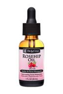 🌹 organic de la cruz rosehip oil, premium cold-pressed chilean rosehip seed oil, natural anti aging moisturizer for diminishing fine lines, wrinkles, and scars 1fl oz logo