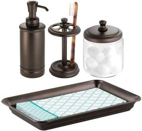 img 4 attached to mDesign Bronze Bathroom Vanity Countertop and Sink Accessory Set - Includes Glass Canister Jar, Toothbrush Holder, Soap Pump Dispenser, and Vanity Tray - Set of 4